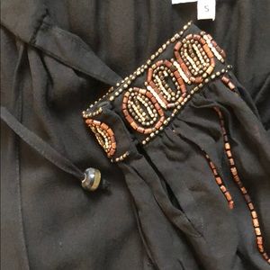 Black drop-shoulder sheer blouse with wooden beads